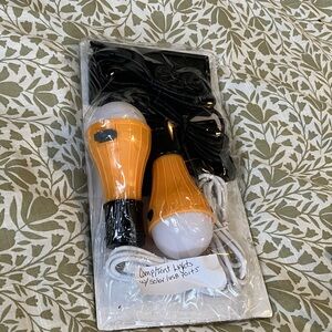 Orange and White Solar Powered Lights. NWOB
